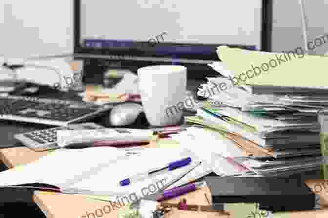 A Cluttered Desk With Piles Of Paper And Objects. What Your Clutter Is Trying To Tell You: Uncover The Message In The Mess And Reclaim Your Life
