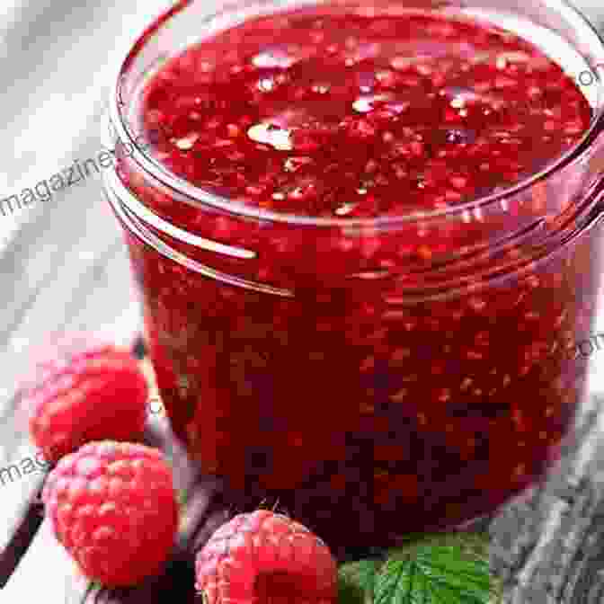 A Delectable Assortment Of Fruit Preserves, Including Strawberry Jam, Raspberry Jelly, And Peach Preserves, Arranged In Various Glass Jars. Saving The Season: A Cook S Guide To Home Canning Pickling And Preserving: A Cookbook