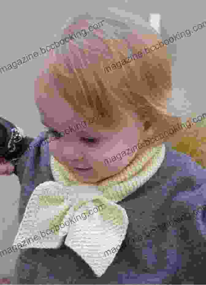 A Smiling Child Proudly Displaying A Knitted Scarf Created Using The Techniques From 'Kids Knit.' Kids Knit: 20 Projects With Fun Techniques To Learn