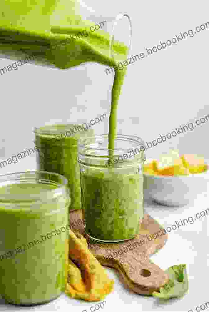 A Vibrant Green Smoothie In A Glass With Fresh Ingredients Surrounding It CINNAMON LEAF ESSENTIAL OIL POWERFUL ANTISEPTIC HEALER: Research Studies Prove Effectiveness Plus How To User Guide Recipes