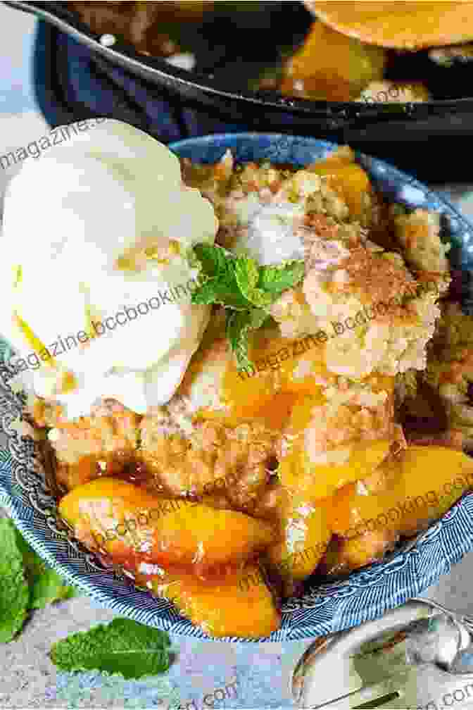A Warm And Comforting Homemade Peach Cobbler Served With A Scoop Of Vanilla Ice Cream A Sweet Treat That Embodies Southern Charm Southern Grit: 100+ Down Home Recipes For The Modern Cook