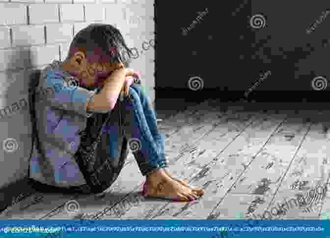 A Young Child Sits Alone In A Dark Room, Head In Hands. The Child's Expression Is One Of Sadness And Despair. Stuck In Time: The Tragedy Of Childhood Mental Illness
