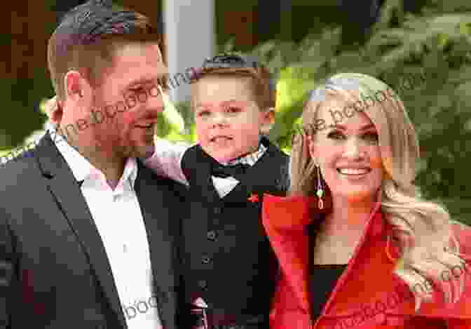 Mike Fisher With His Wife, Carrie Underwood, And Their Sons Defender Of Faith Revised Edition: The Mike Fisher Story (ZonderKidz Biography)